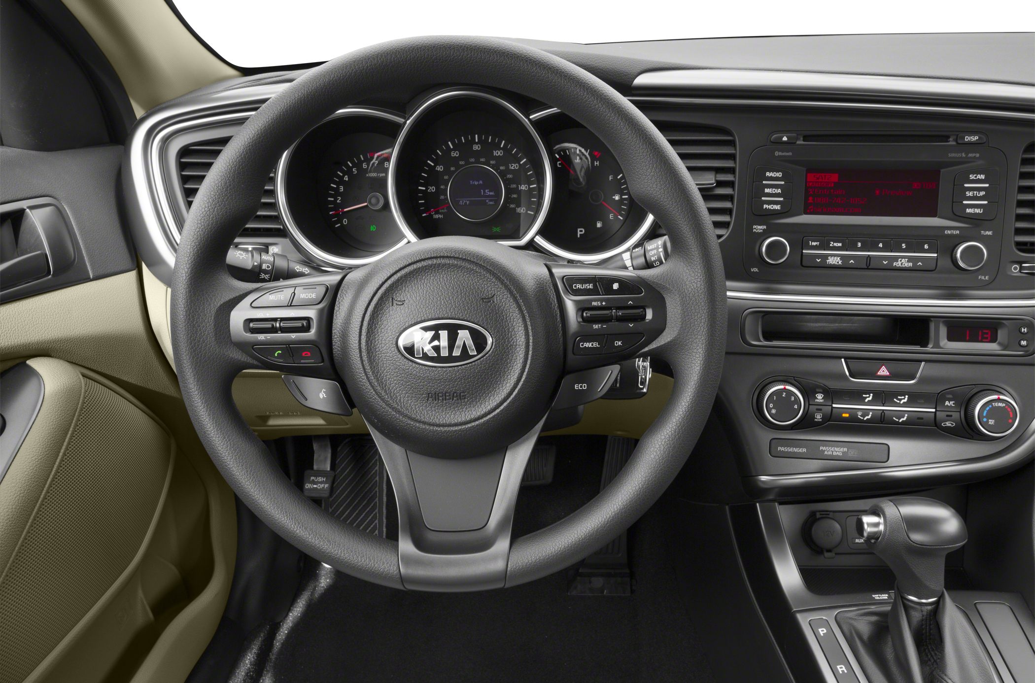 Steering wheel and dashboard with instrument cluster and controls