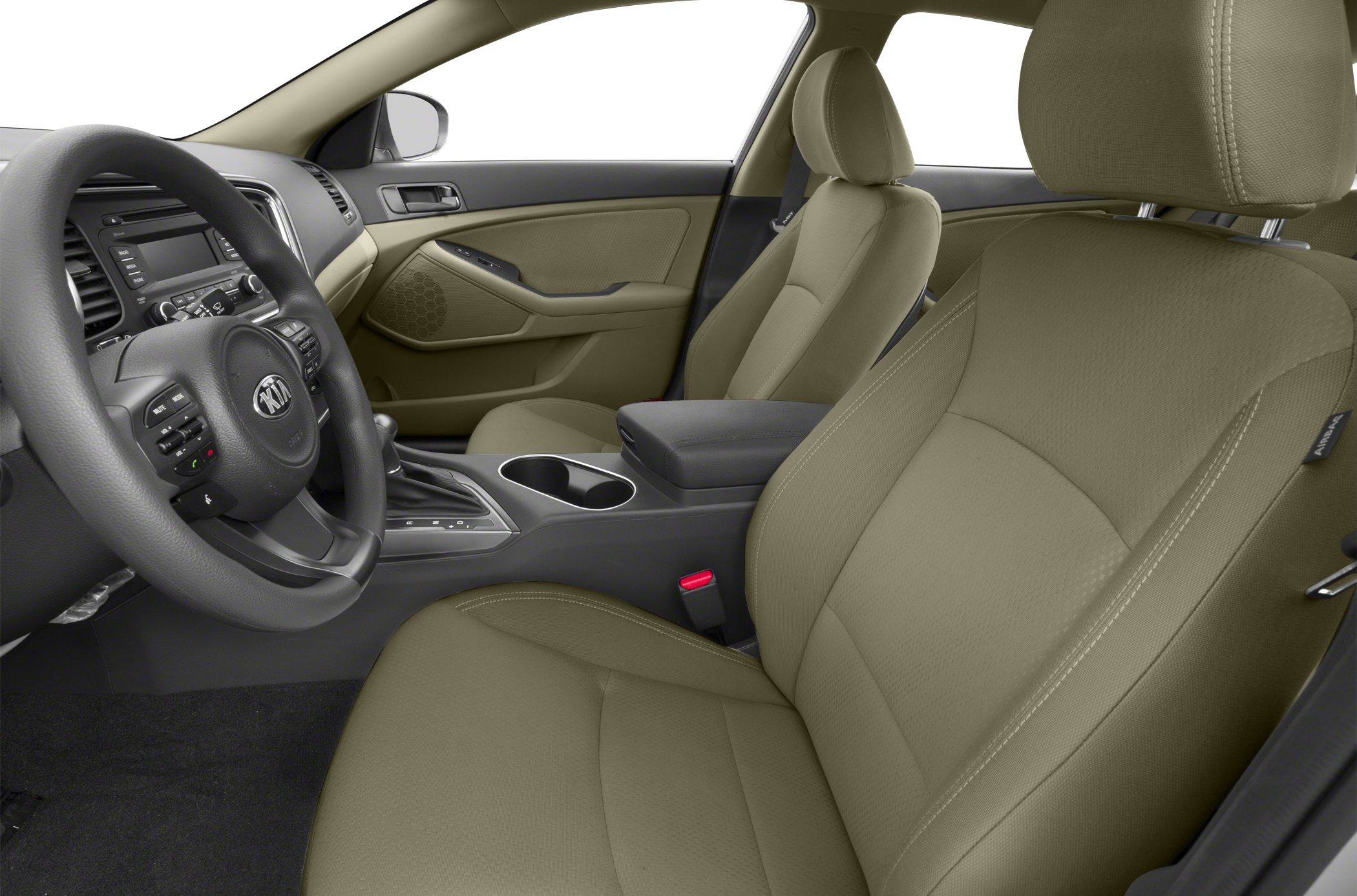 Steering wheel, dashboard, and front seats of car interior