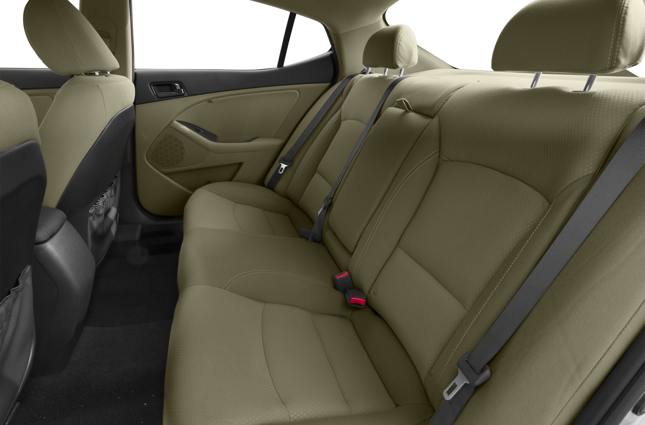 Spacious beige rear car seats with seatbelts and door panel