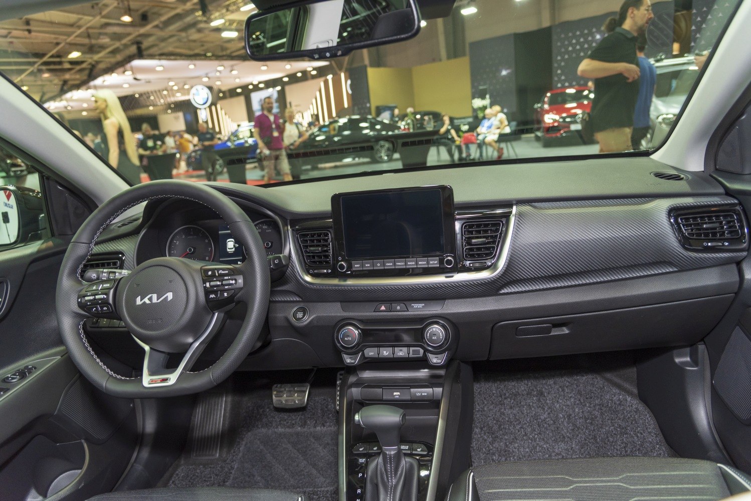 Modern car interior with touchscreen and multifunction steering wheel