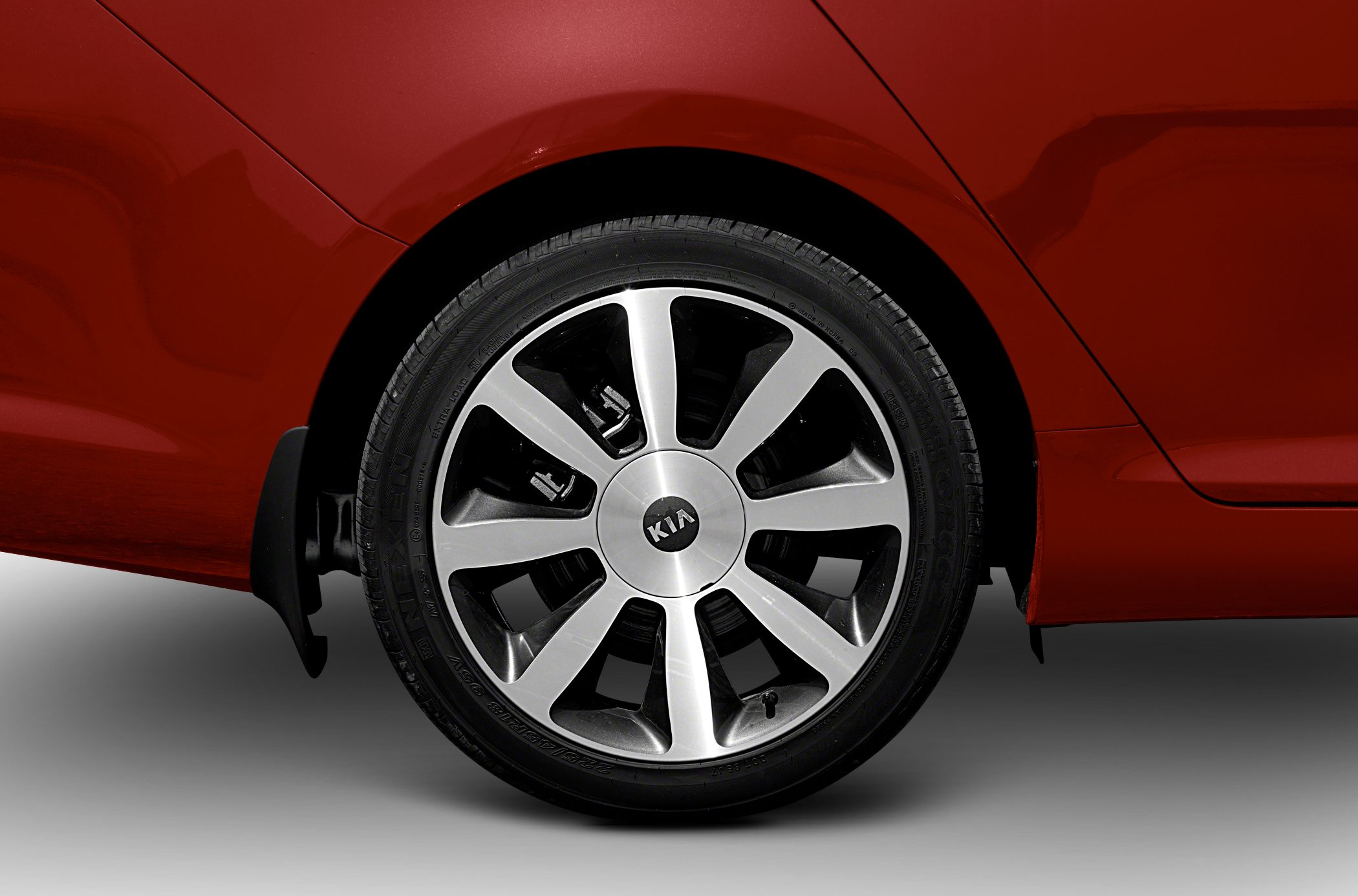 Alloy wheel with multi-spoke design and red rear fender
