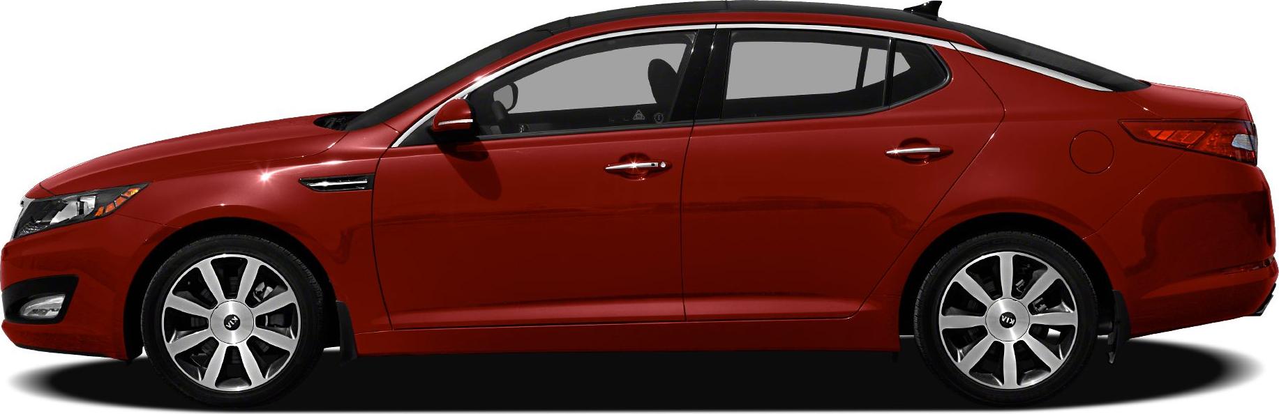 Side profile of red mid-size sedan with alloy wheels