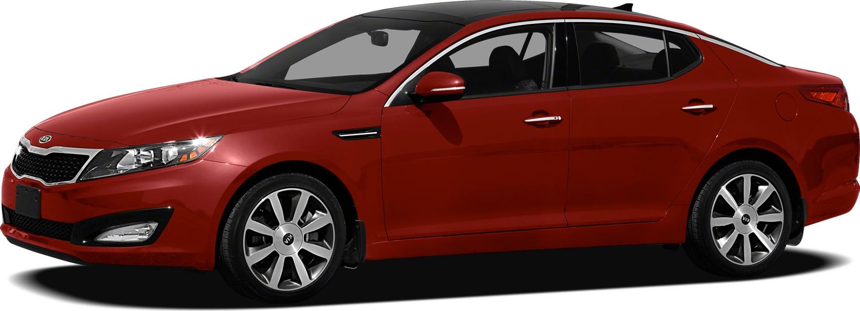 Red sedan side profile with alloy wheels and black roof