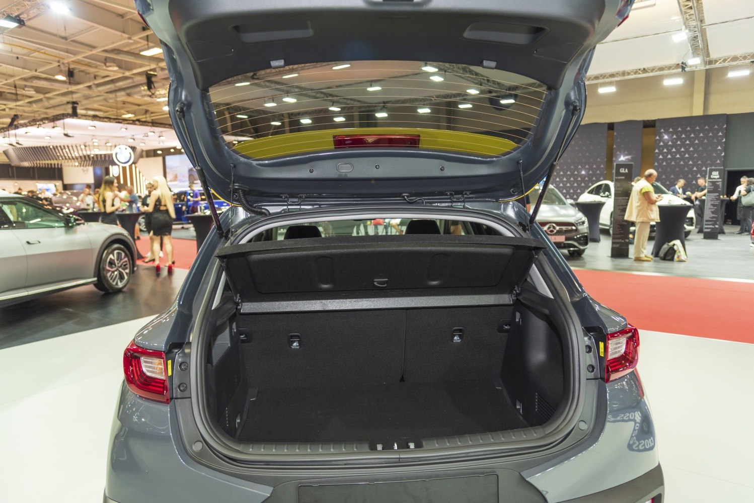 Open hatchback trunk with spacious cargo area and rear seats.