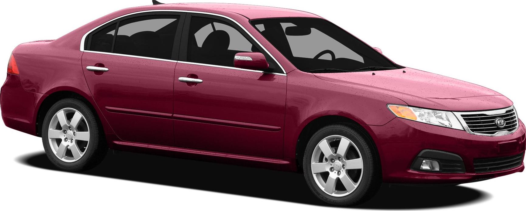 Red sedan side profile with front grille and alloy wheels