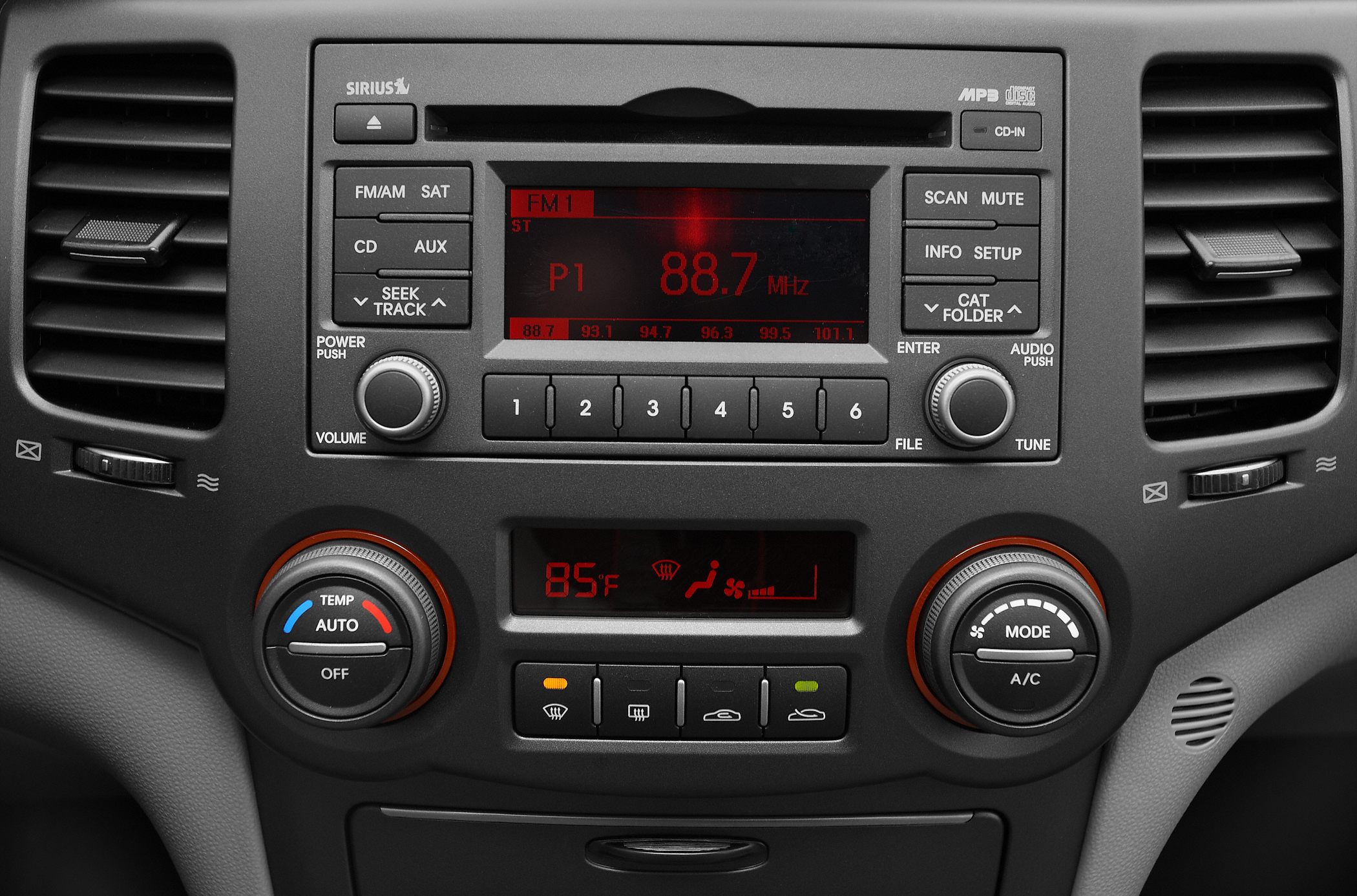 Radio and digital climate control system with multi-function buttons