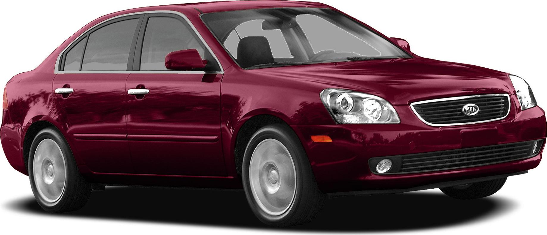 Red sedan with front grille and headlights in dynamic front-side view