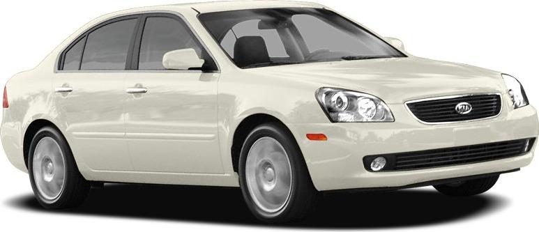 White sedan front side view with clear headlights and alloy wheels