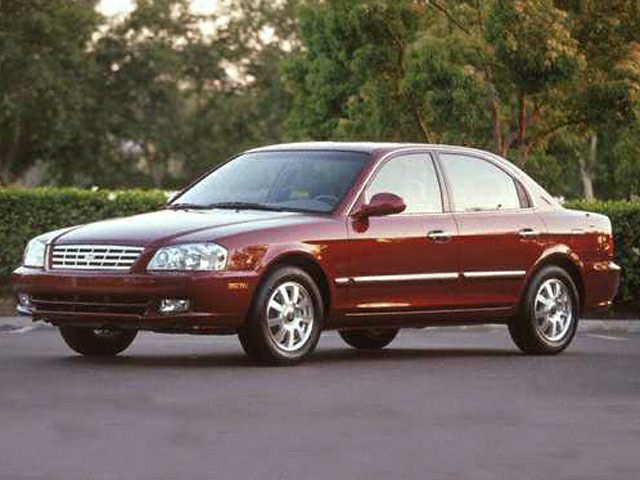 Four-door sedan with classic front grille and early 2000s design.