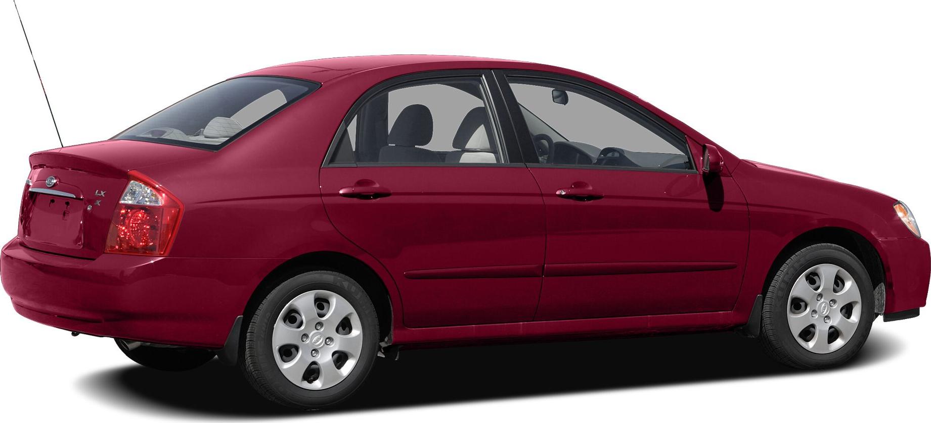 Red sedan side and rear profile with alloy wheels and clear taillights