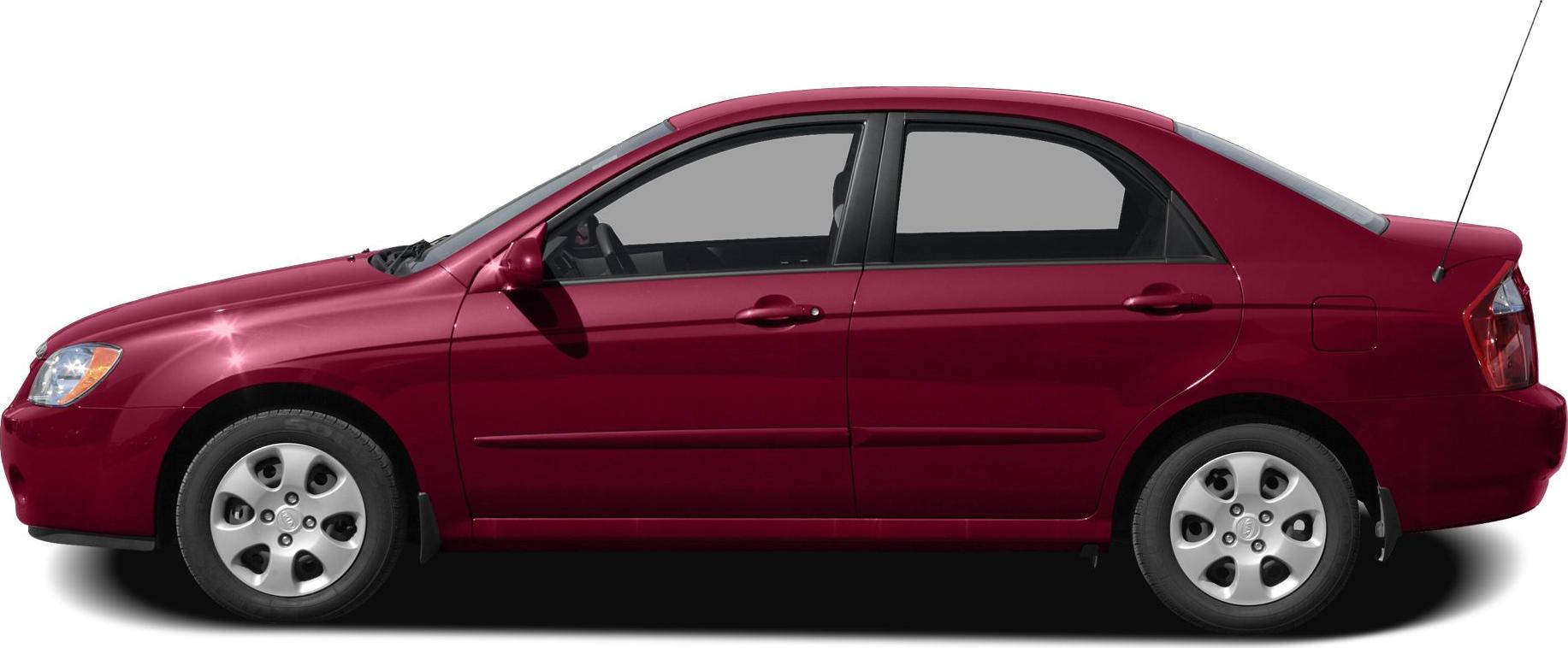 Side profile of a compact sedan with smooth body lines and antenna