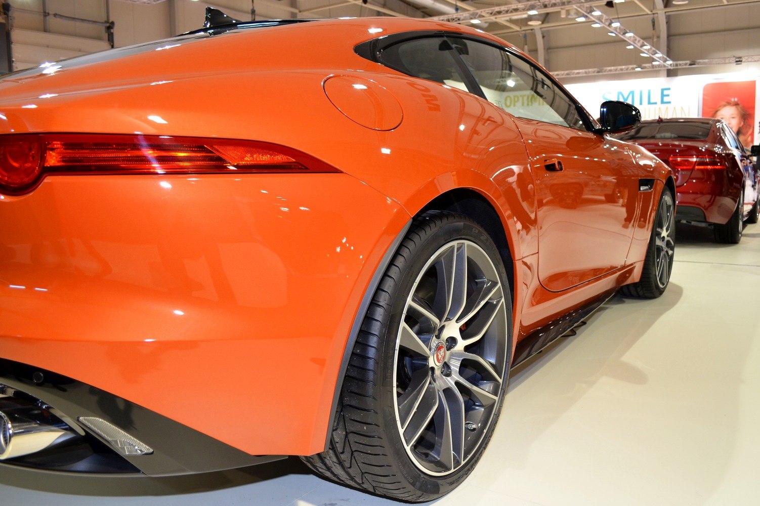 Rear side view and alloy wheel of sports coupe