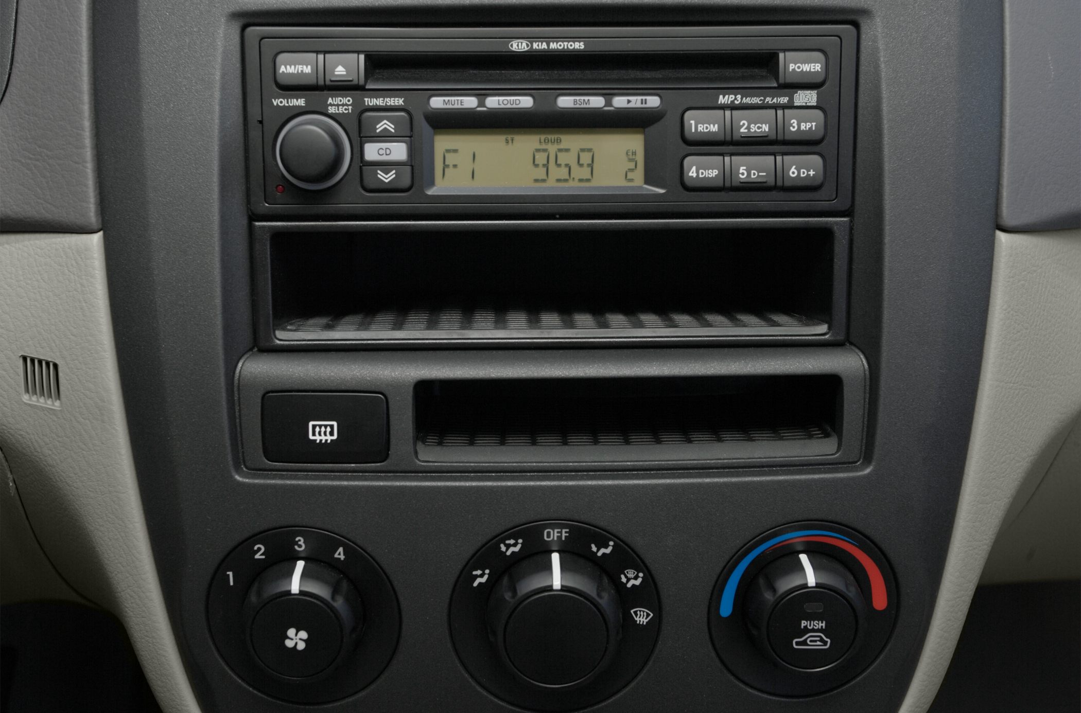 Car radio and climate control dials with storage compartments