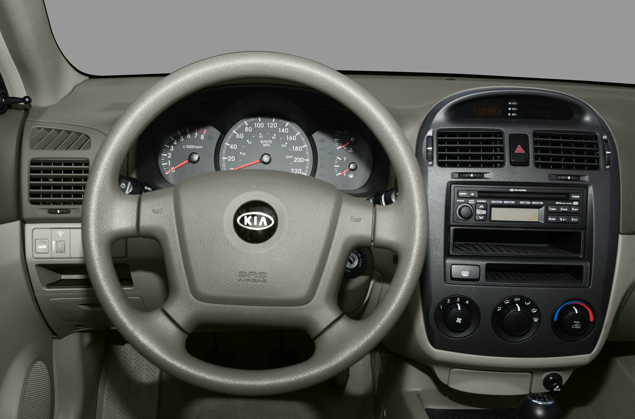 Steering wheel, instrument cluster, and center console with controls