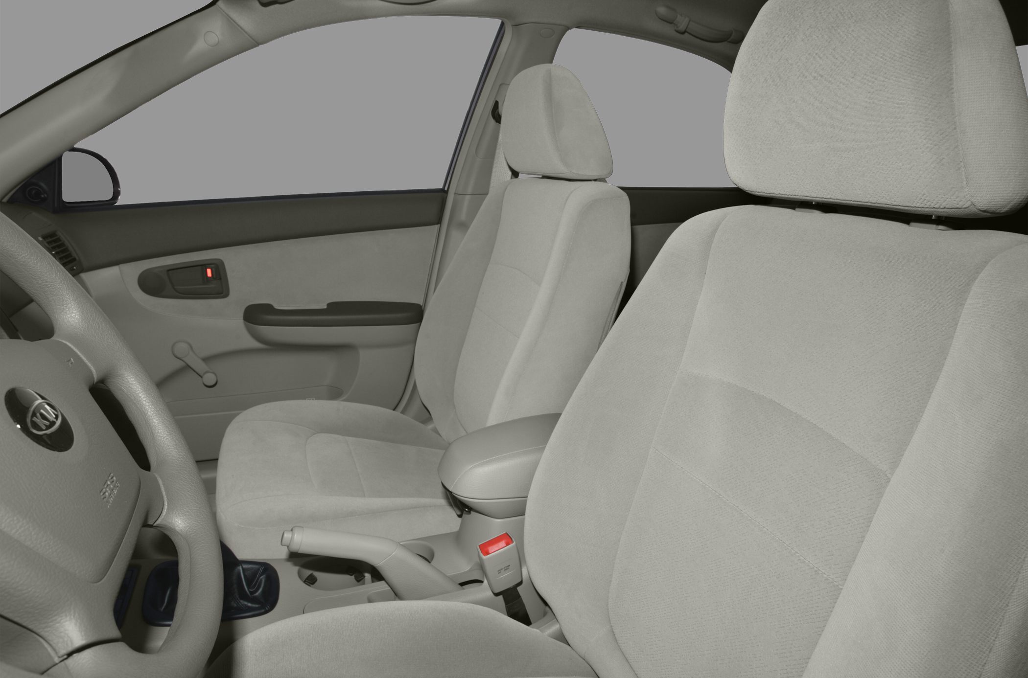 Front seats and door panel with manual window crank and fabric upholstery