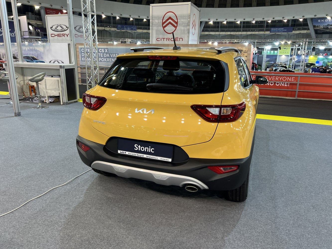 Yellow SUV rear with modern taillights and sporty bumper design