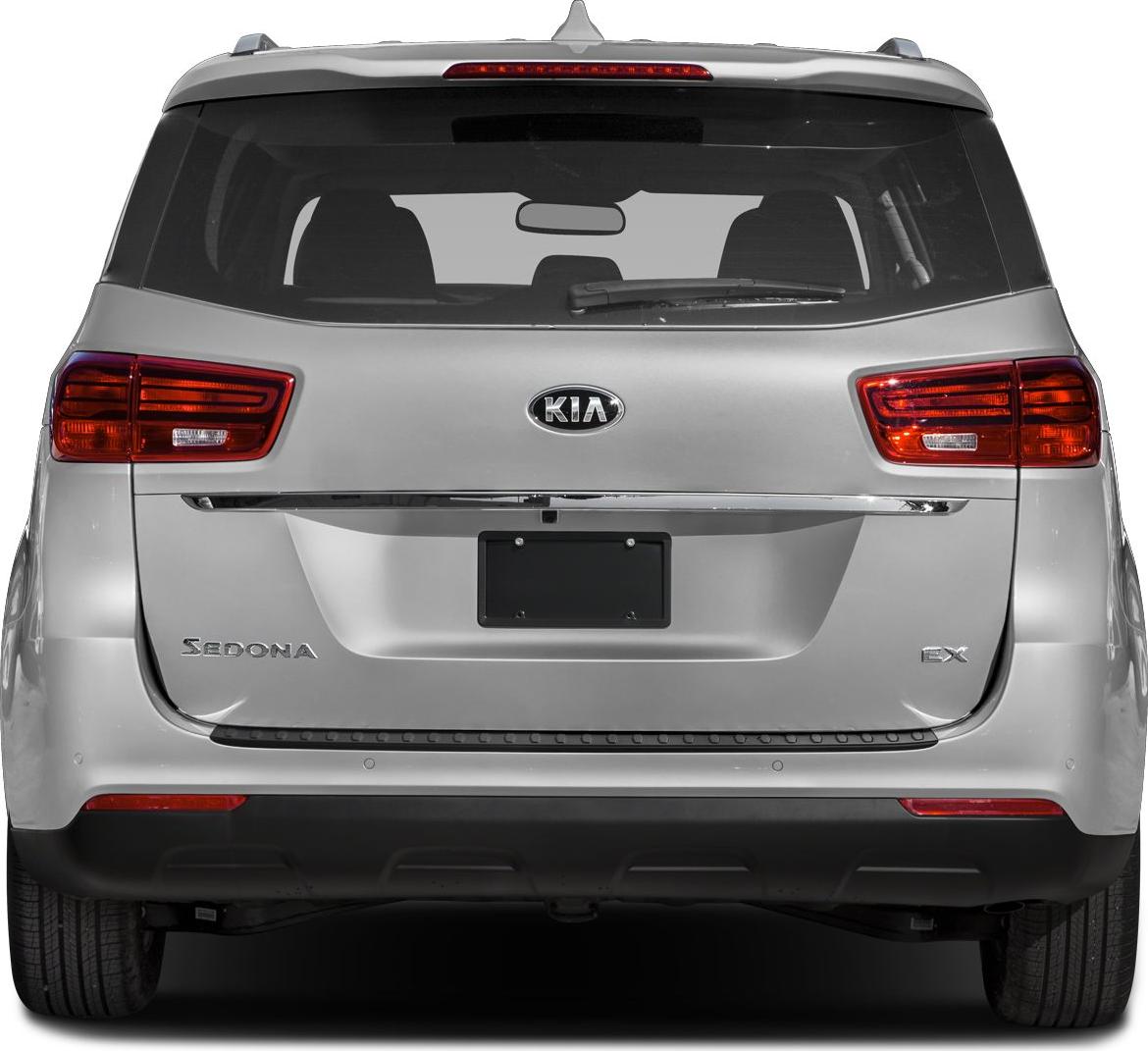 Rear view of minivan with taillights, rear windshield, and license plate area