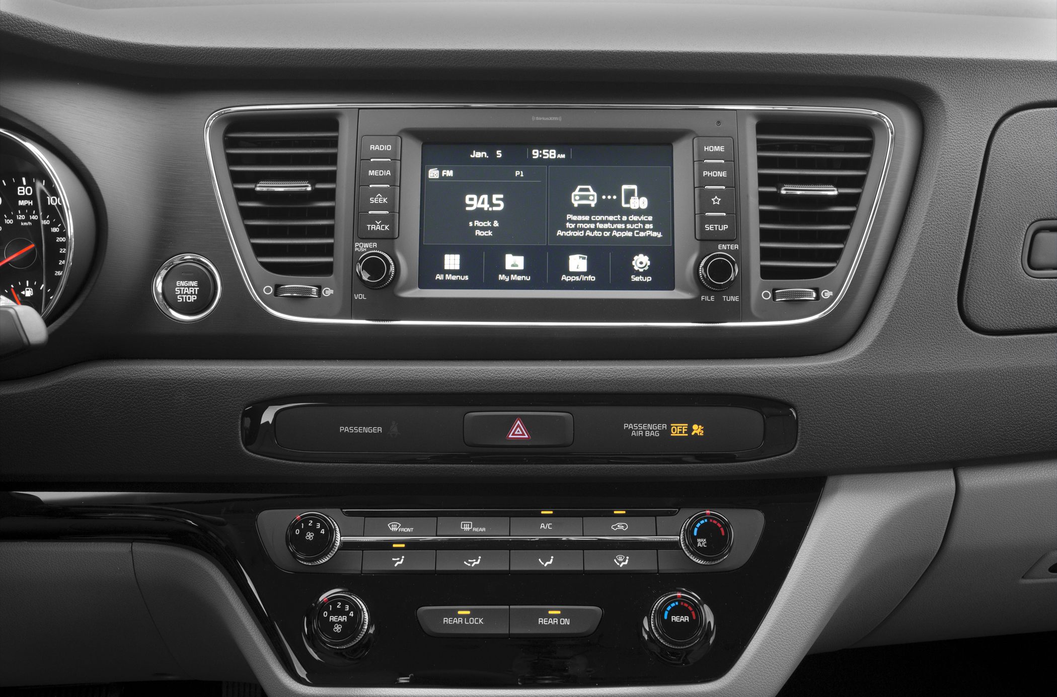 Touchscreen infotainment and climate control panel in vehicle dashboard