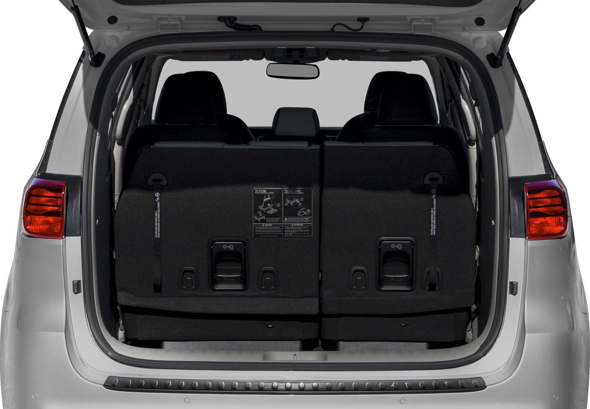 Rear cargo space with foldable third-row seats in minivan