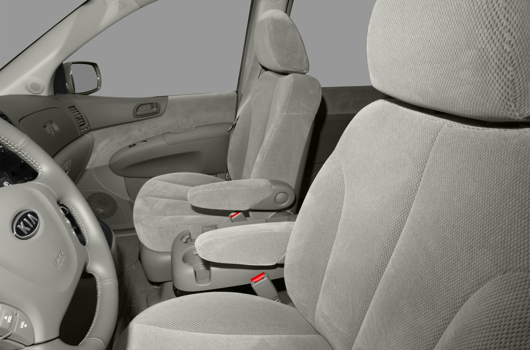 Fabric front seats with armrests and steering wheel view