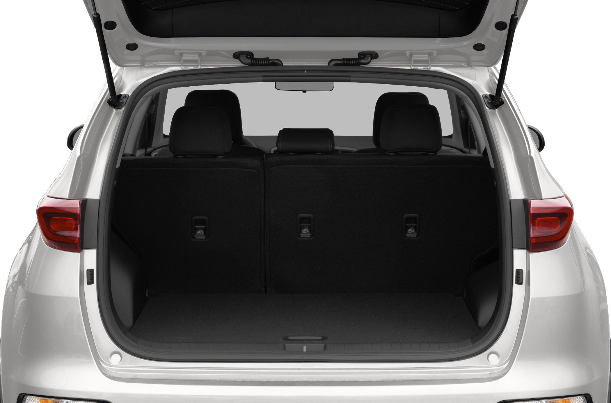SUV rear cargo space with folded seats and trunk opening
