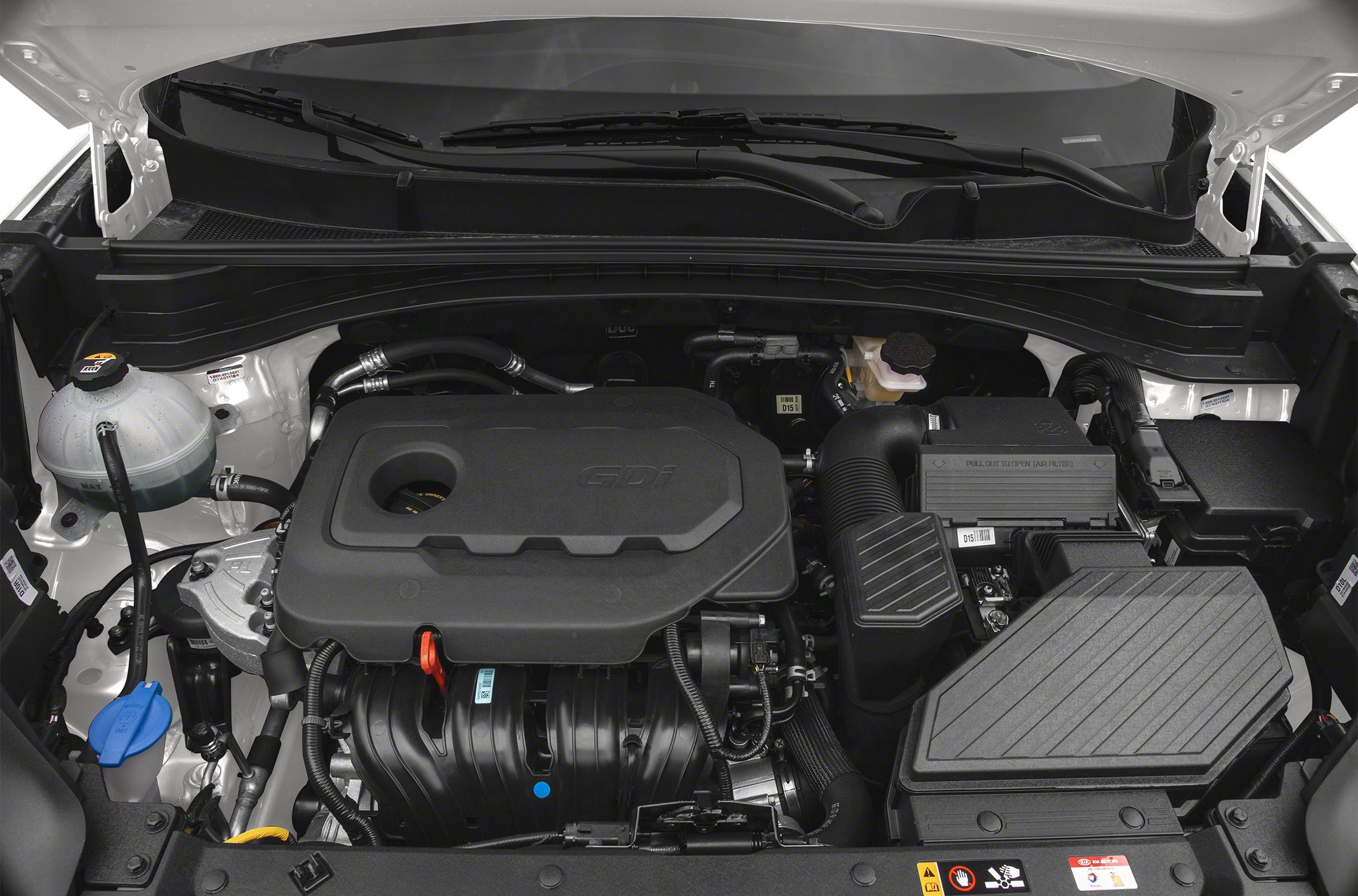 Engine bay with GDI engine cover and various engine components.