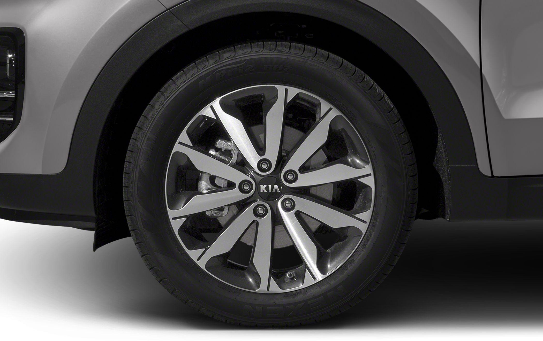 Close-up of alloy wheel and tire with brake caliper