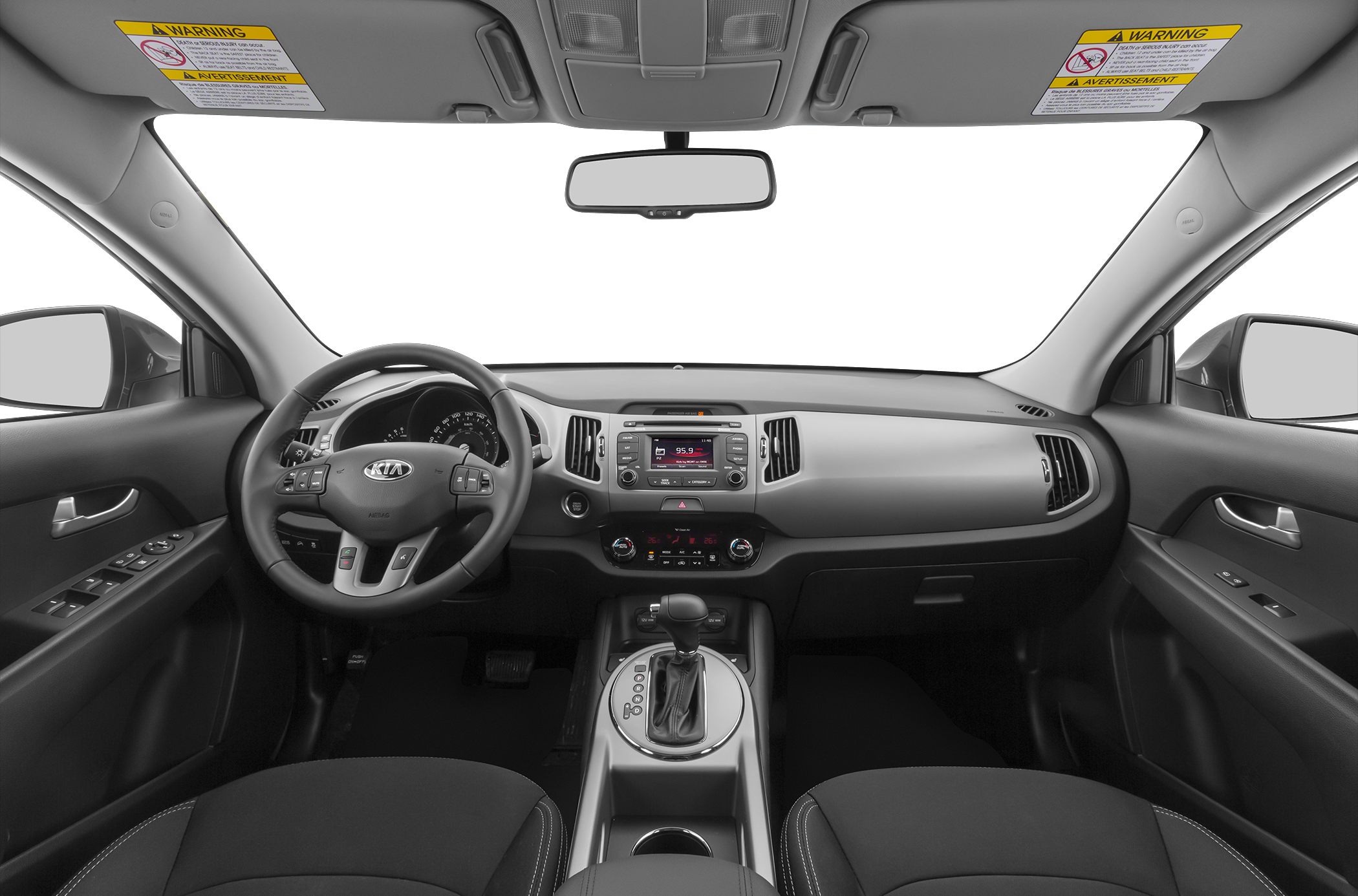 Dashboard, steering wheel, and center console with gear lever