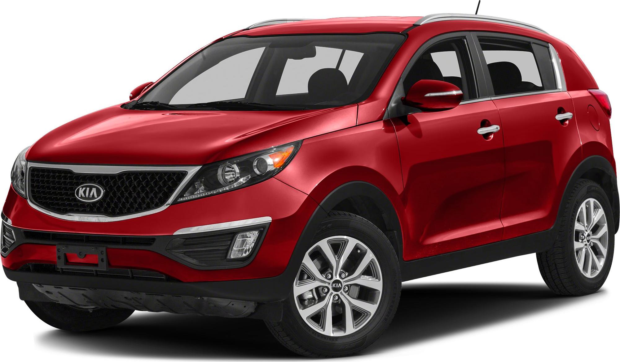 Front-side view of red SUV with grille and alloy wheels