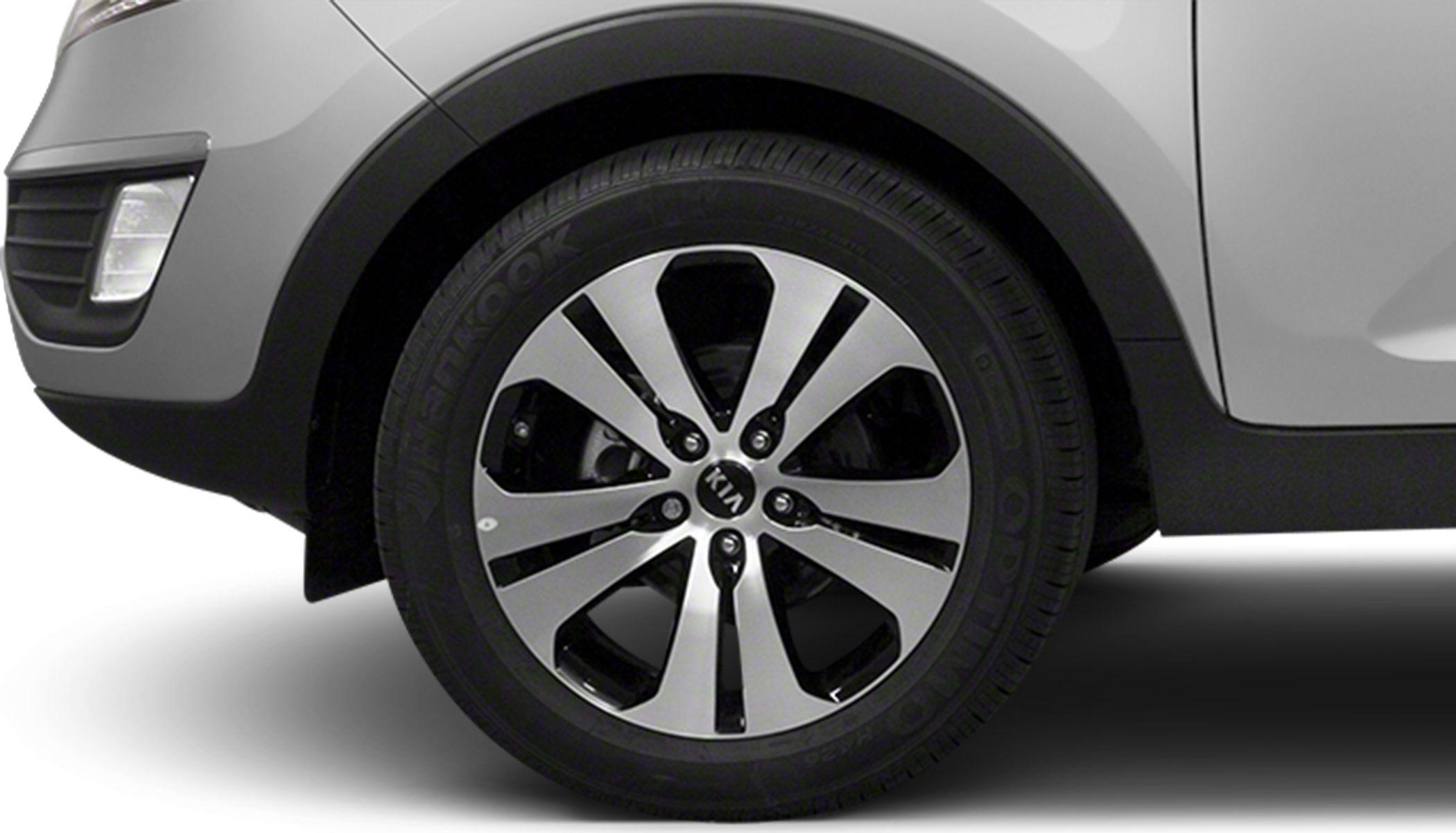 Alloy wheel and tire close-up with distinct rim design