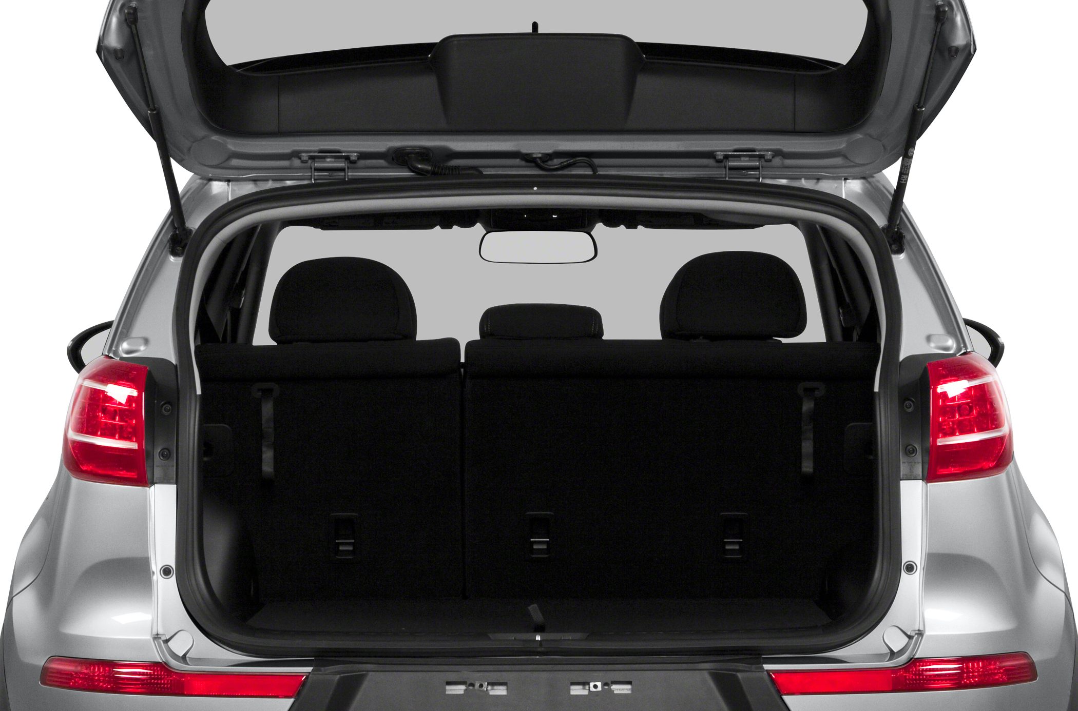 Open trunk showing rear seats and cargo space of an SUV.