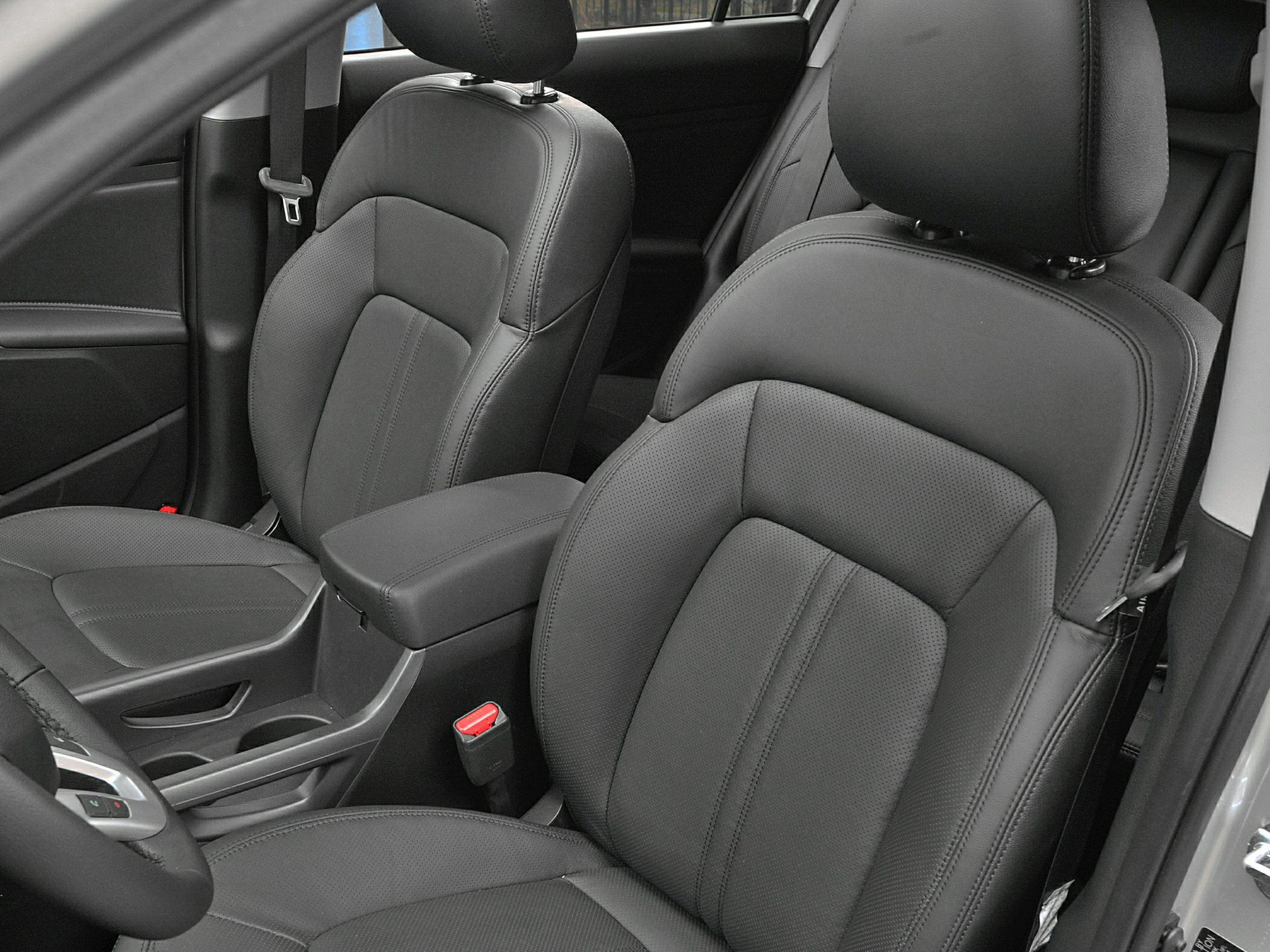 Black leather front seats and center console