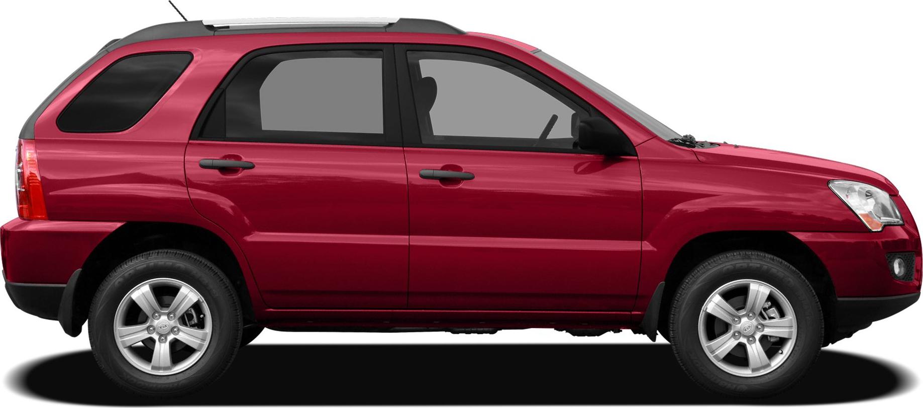 Red compact SUV with side profile and alloy wheels
