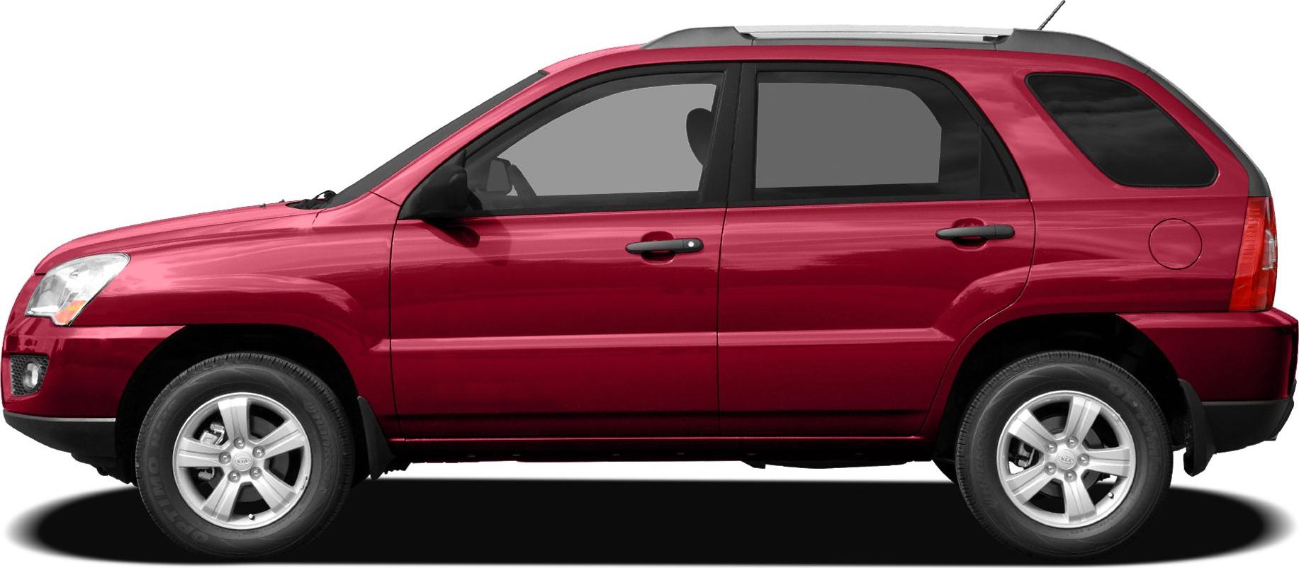 Side profile of red SUV with alloy wheels and tinted windows