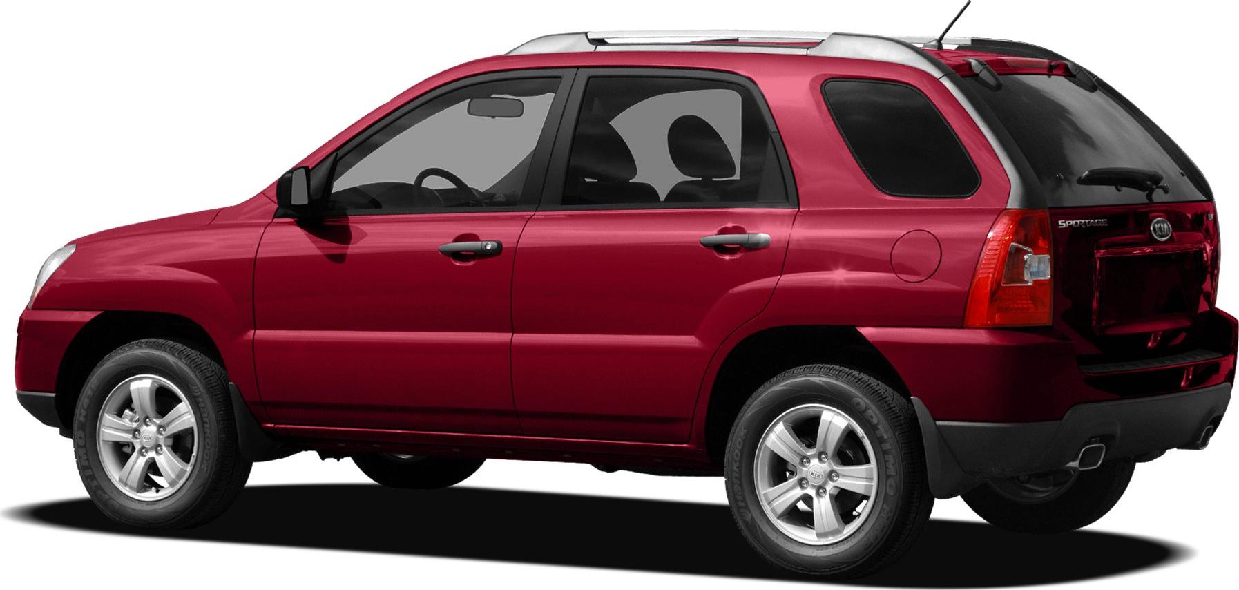 Side profile of red SUV with alloy wheels and roof rails