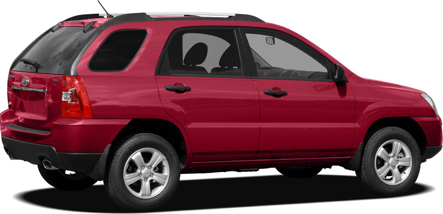 Rear-side view of red SUV with alloy wheels and roof rails