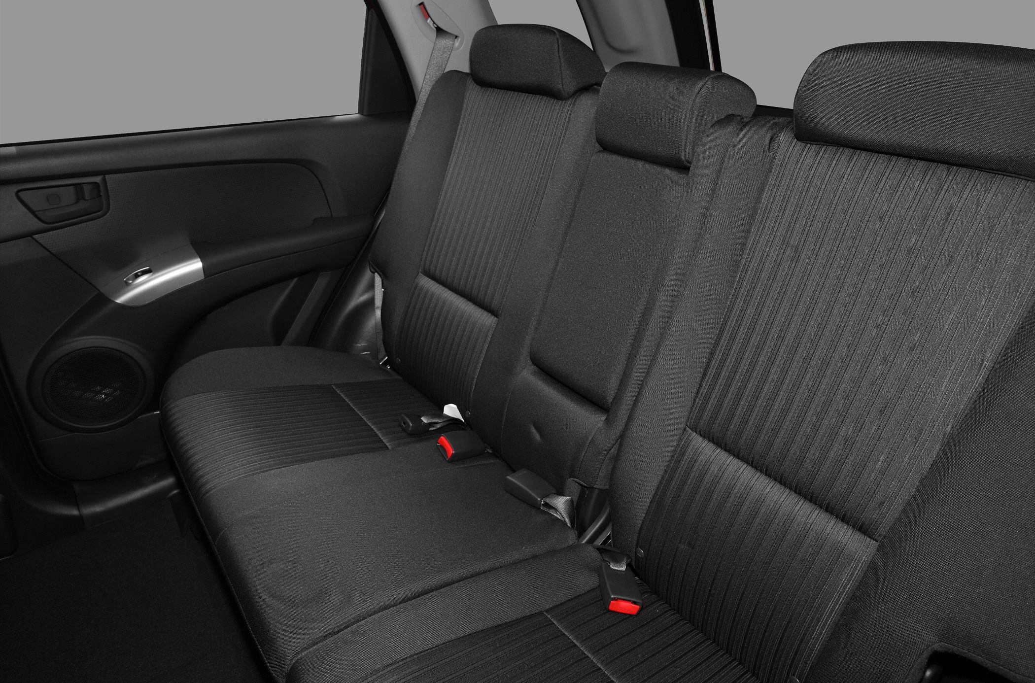 Rear seat fabric upholstery with headrests and door panel interior