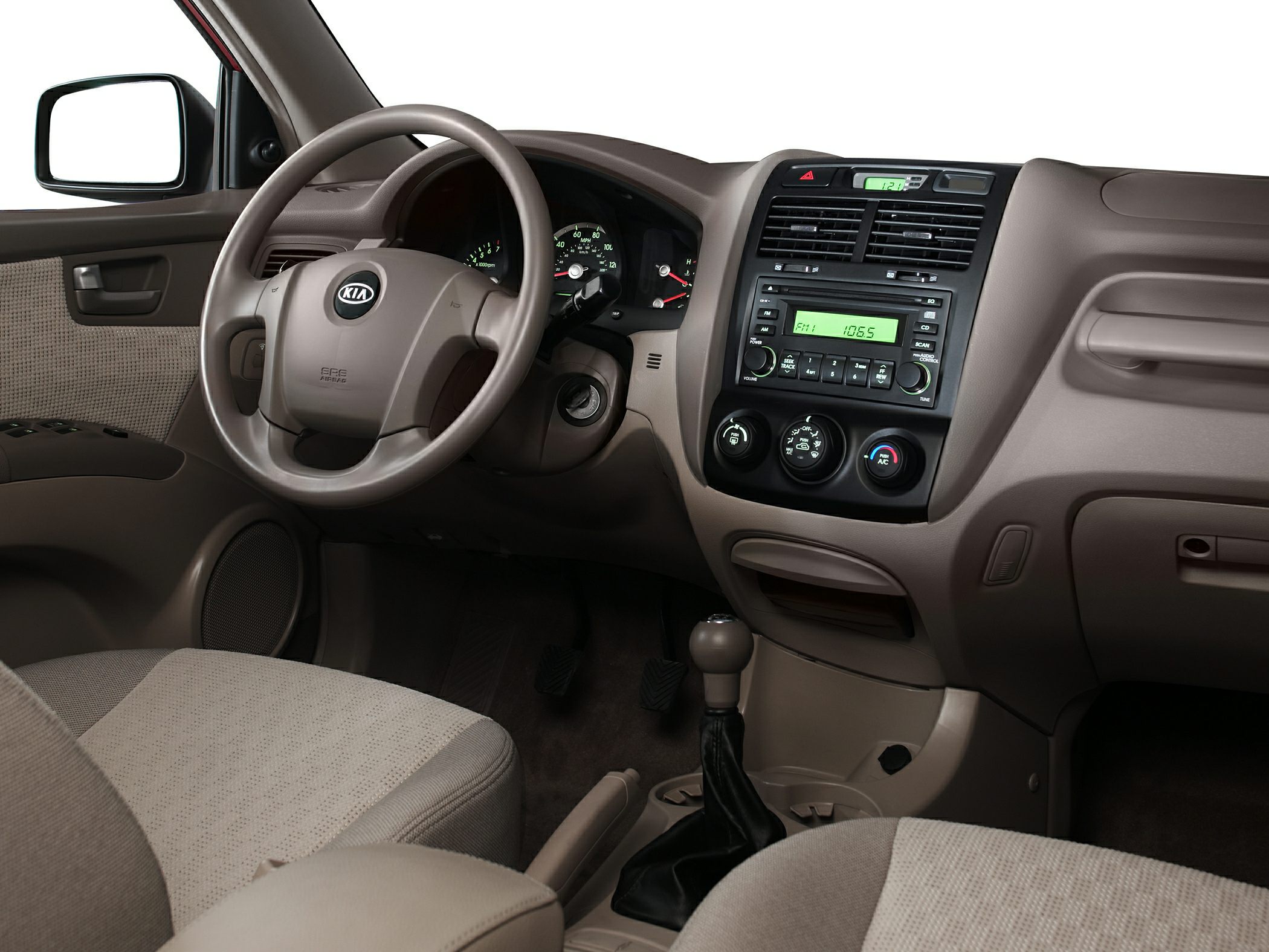 Dashboard and steering wheel with center console and controls in vehicle interior