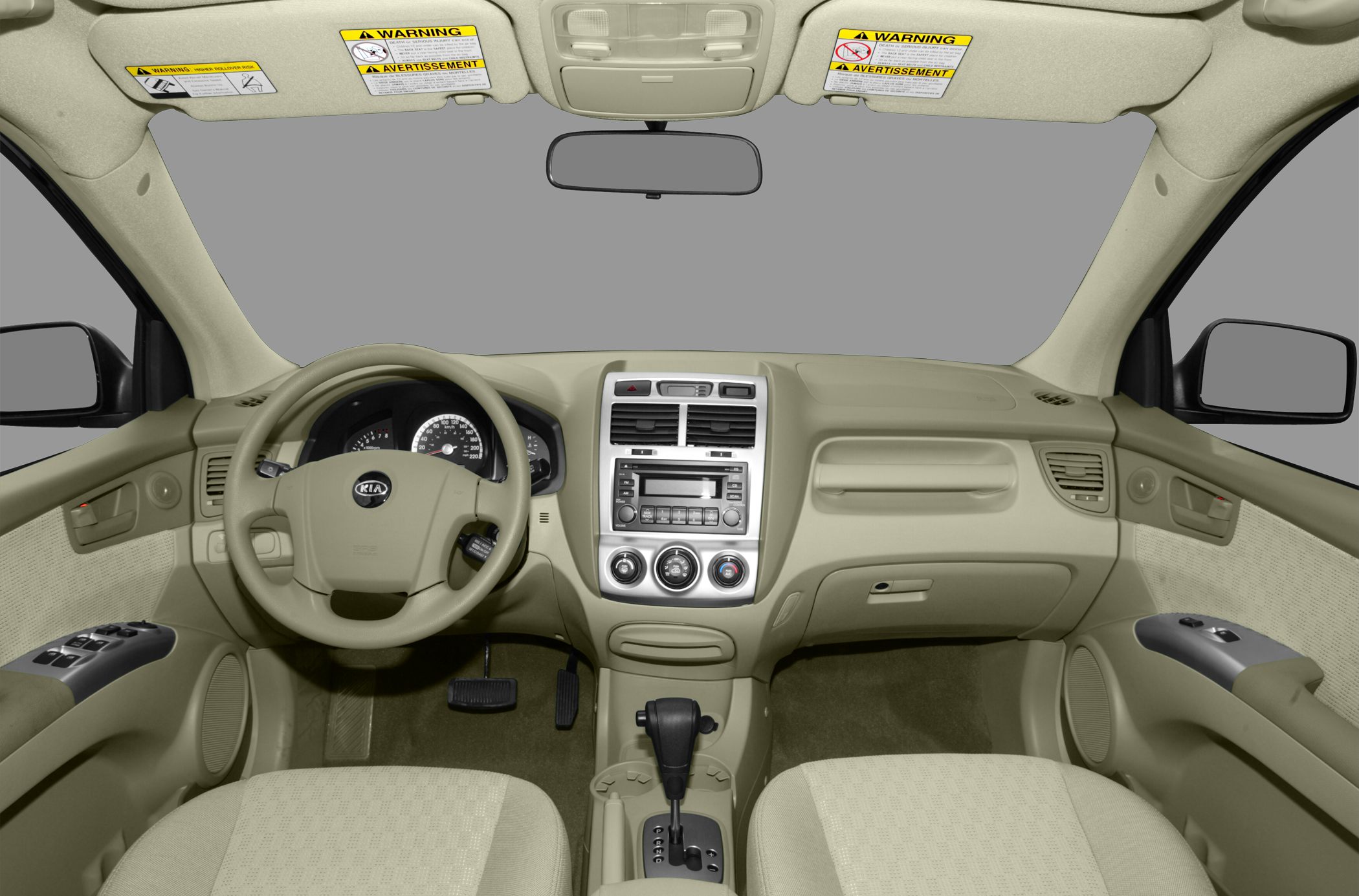 Dashboard and steering wheel with central console in beige interior