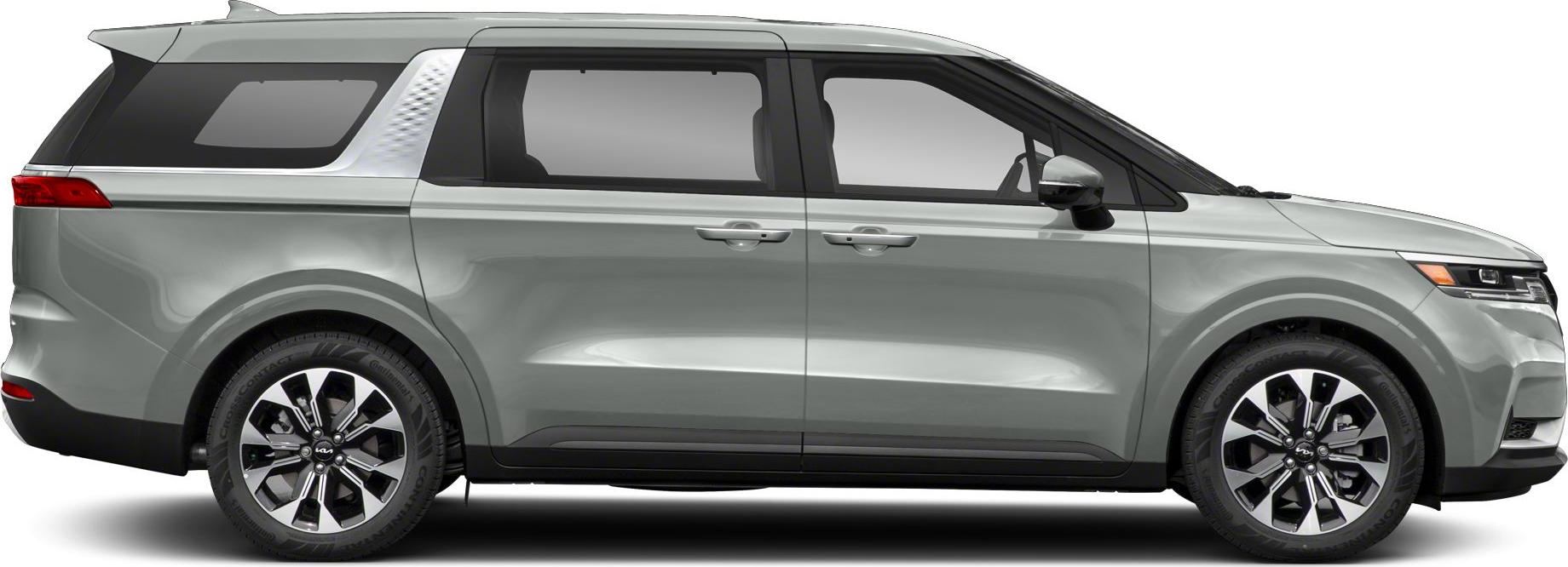 Side profile of minivan with distinct alloy wheels and sliding doors