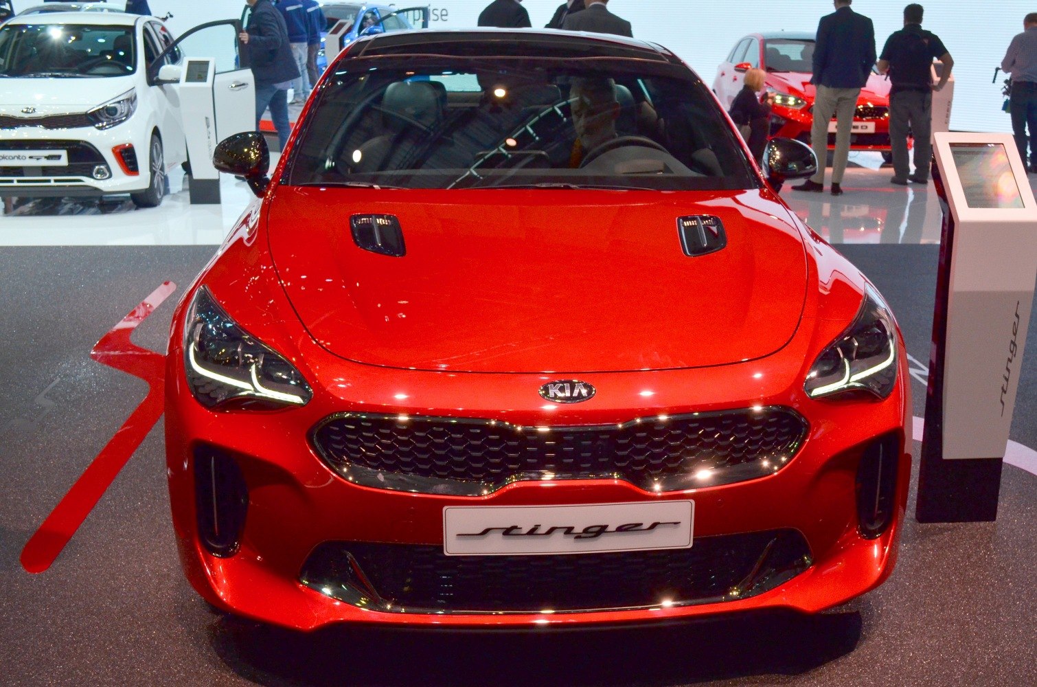 Front view with sporty hood vents and LED headlights
