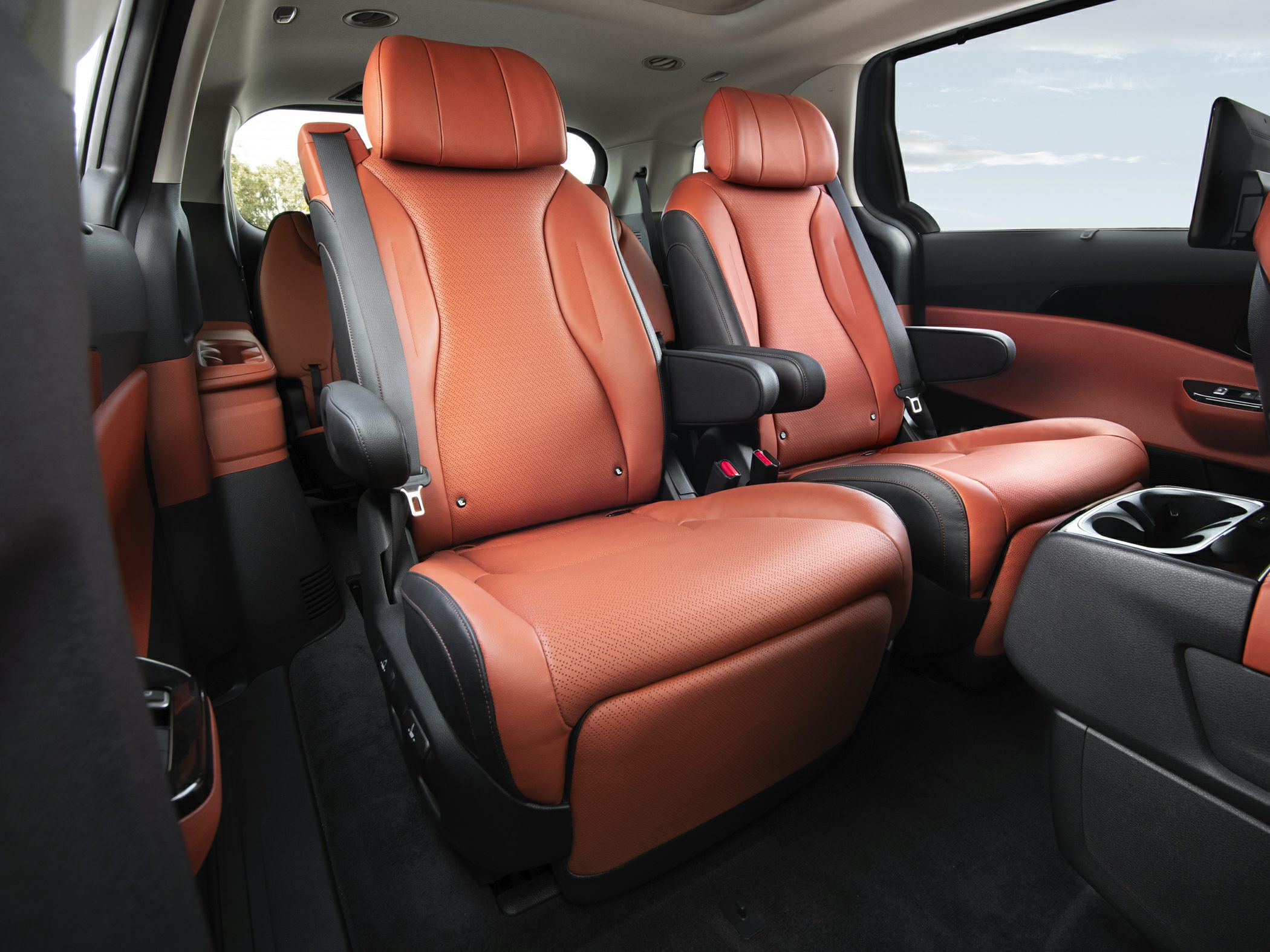 Second-row luxury captain seats with perforated leather upholstery