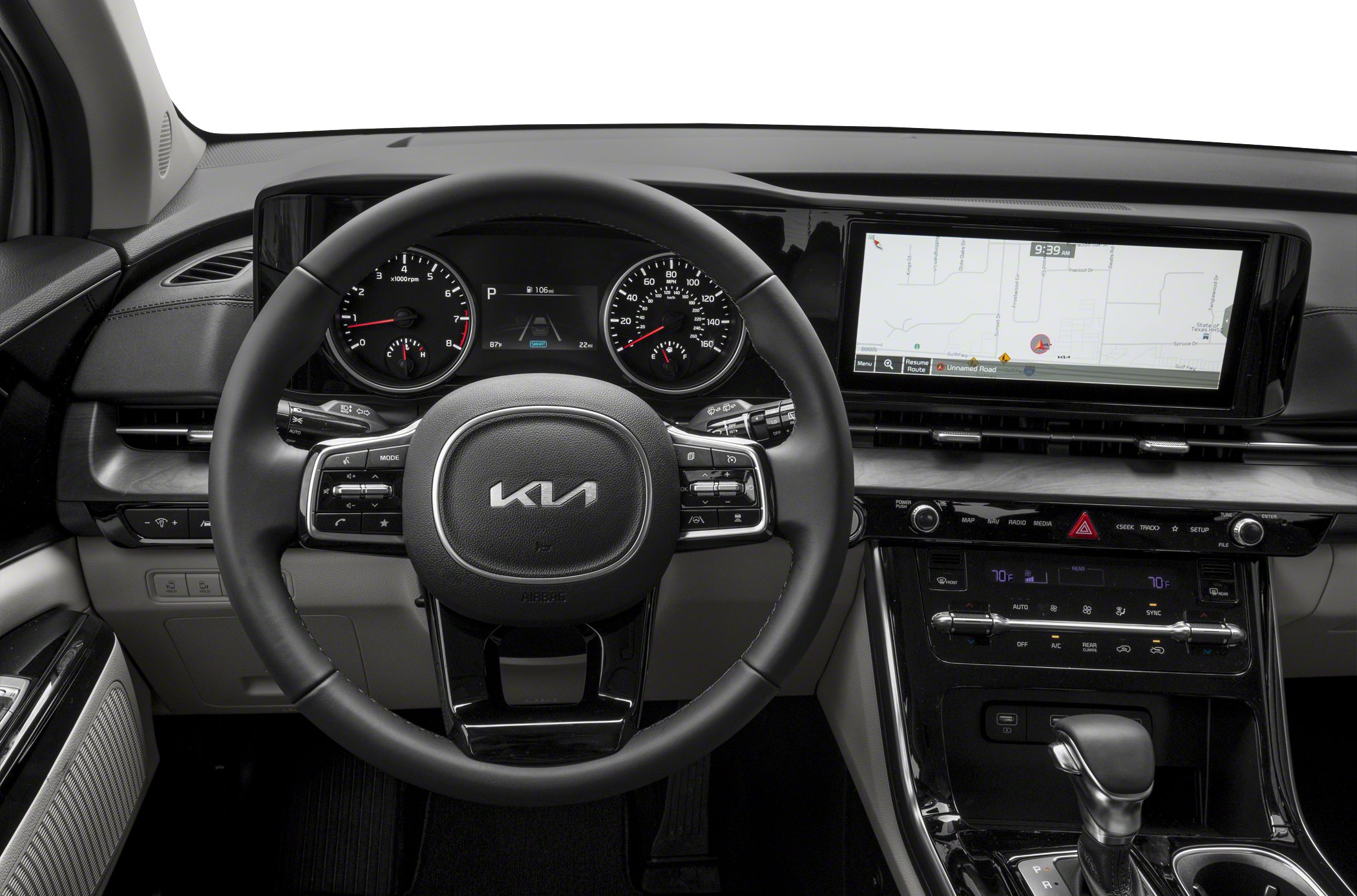 Interior dashboard with digital instruments and touchscreen, modern steering wheel with controls.