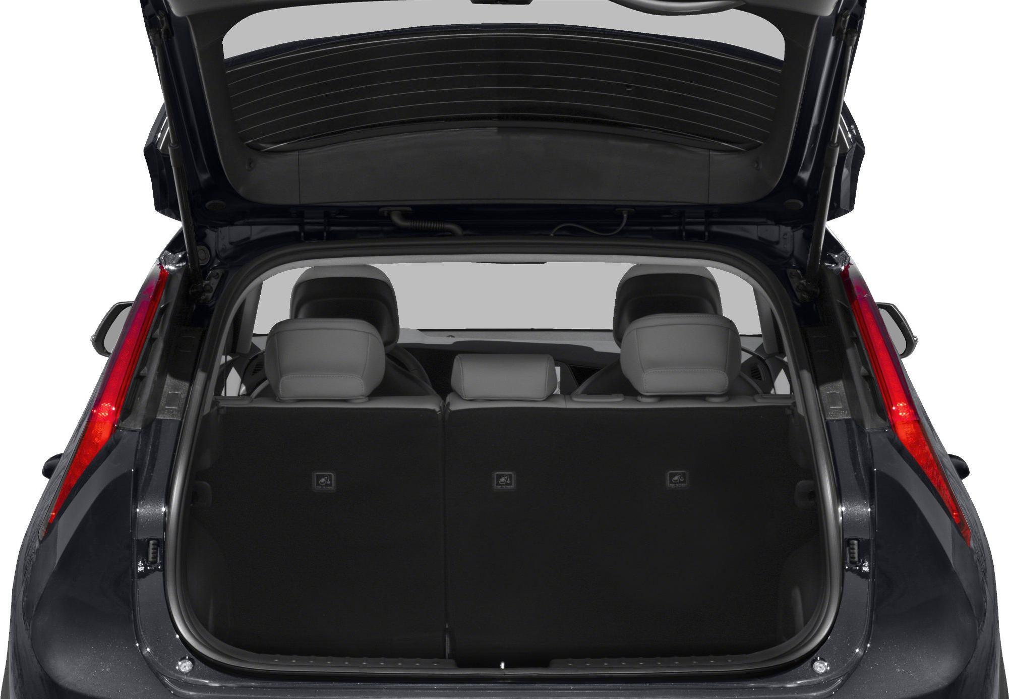 Open rear hatch showing spacious trunk and three rear headrests.