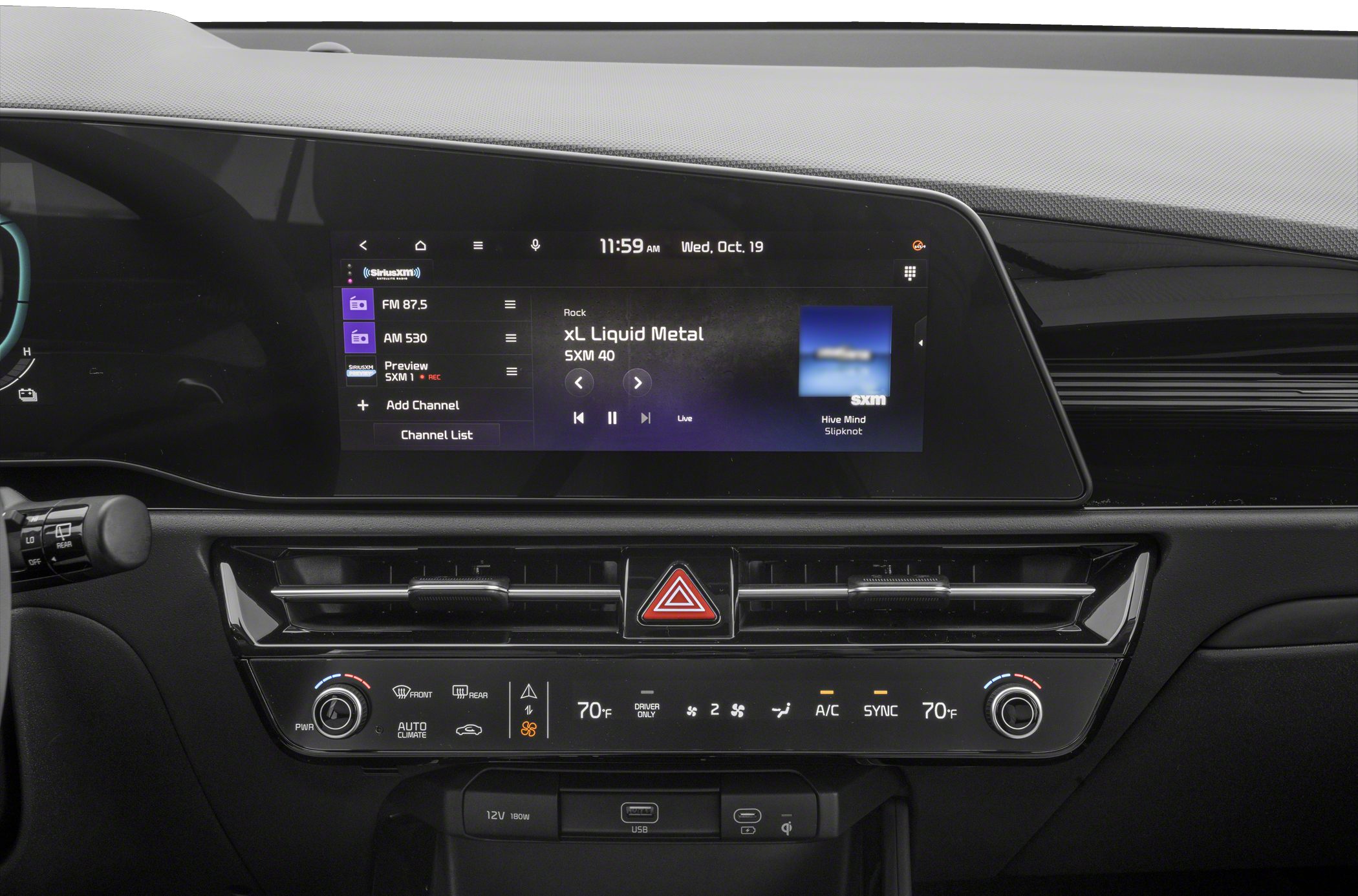 Touchscreen infotainment and digital climate control panel.