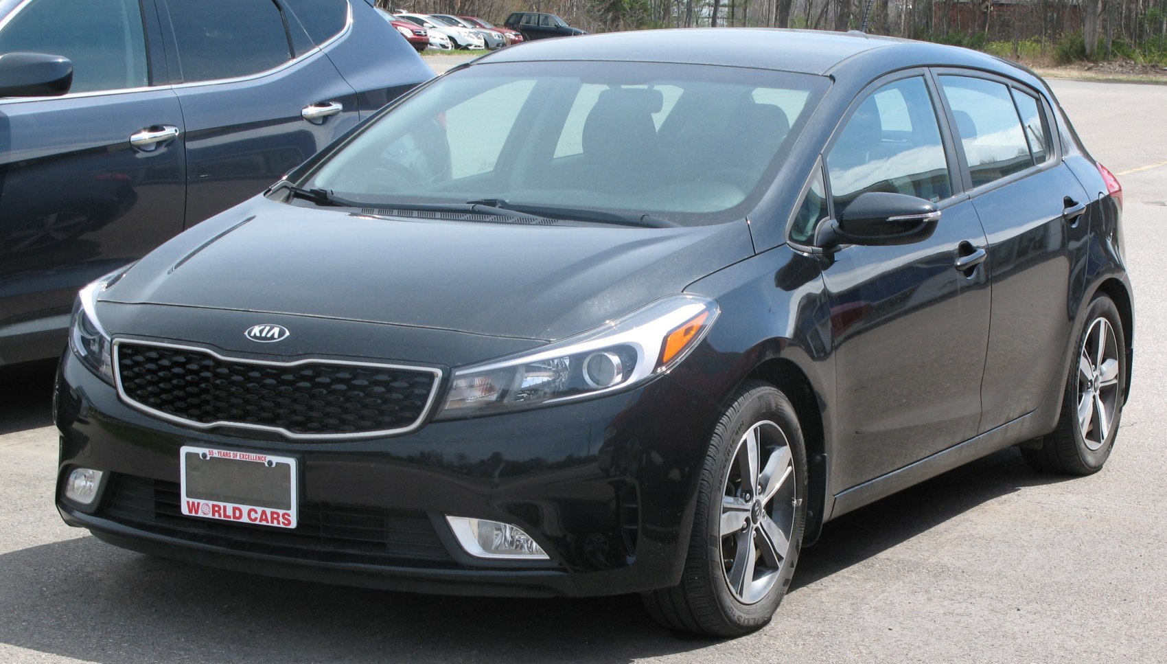 Front view of facelifted hatchback with alloy wheels and modern headlights