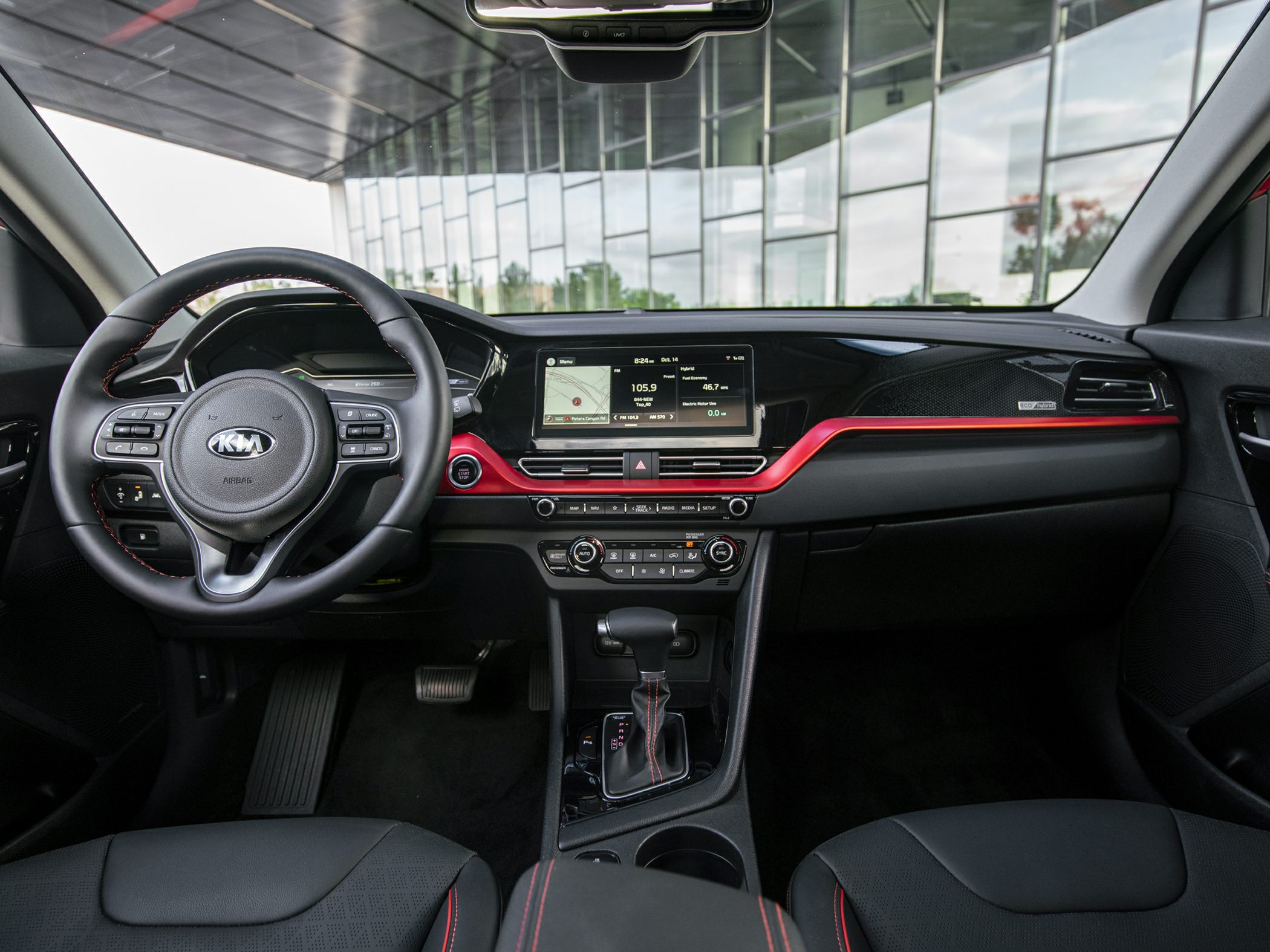 Dashboard with infotainment screen and multifunction steering wheel