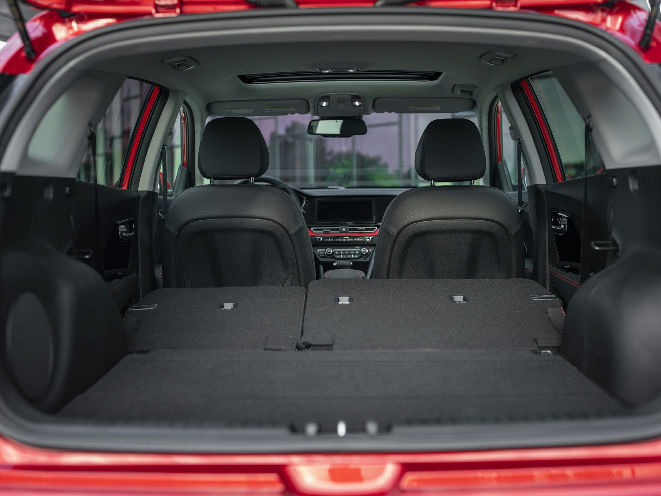 Folded rear seats with spacious interior and panoramic sunroof