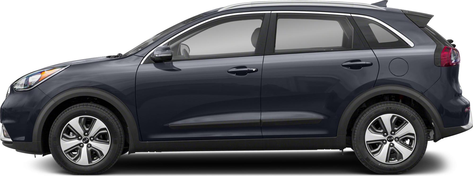 Side profile view with distinctive alloy wheels