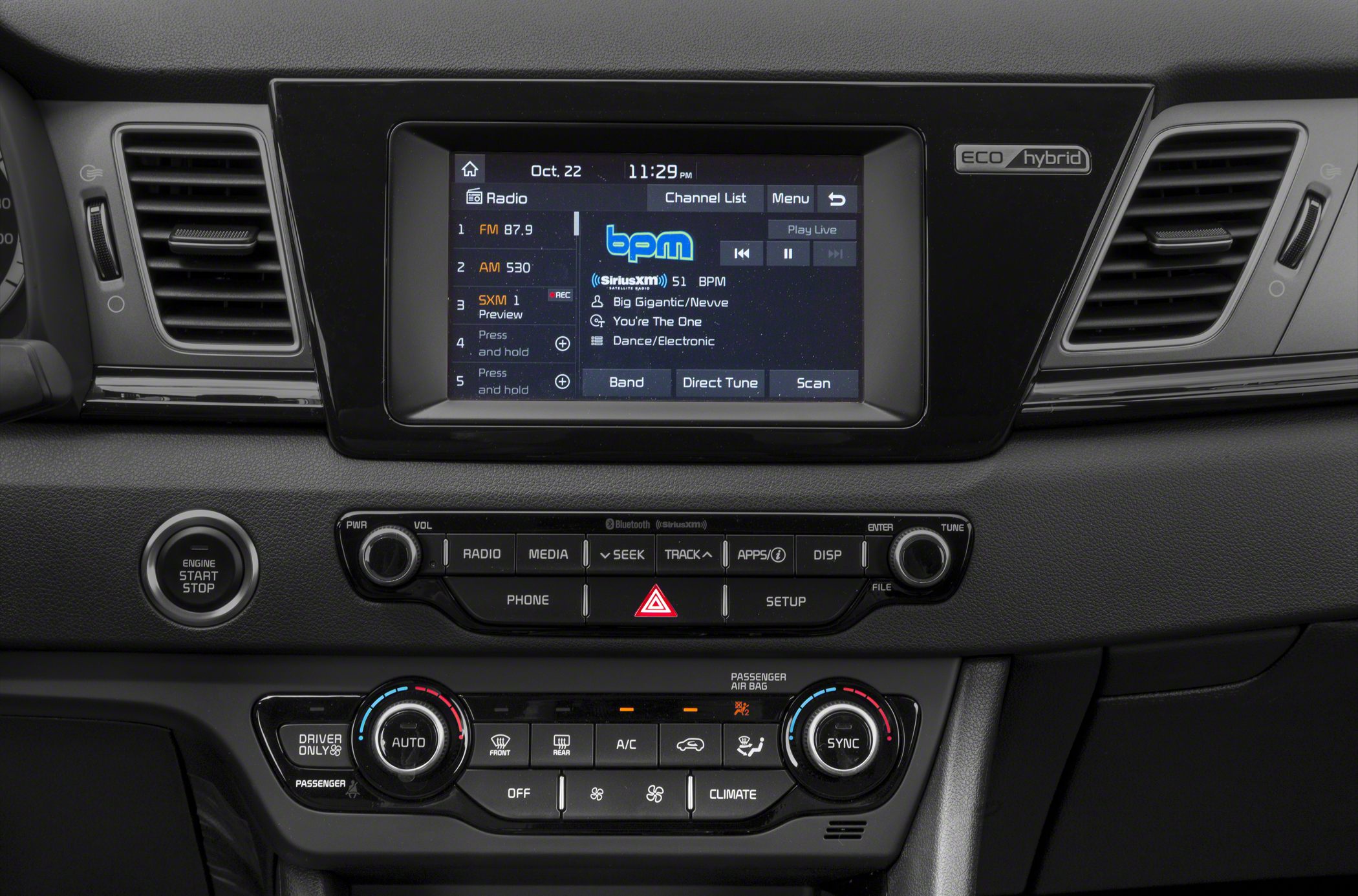Infotainment touchscreen and climate control panel in hybrid vehicle interior